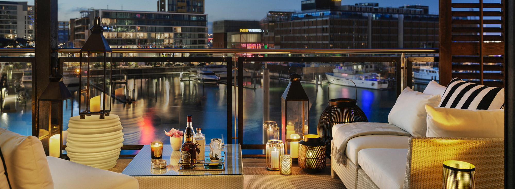 Romantic Alfresco Outdoor Terrace by Night with Harbour Views | Point Residence Auckland Luxury Waterfront Accommodation